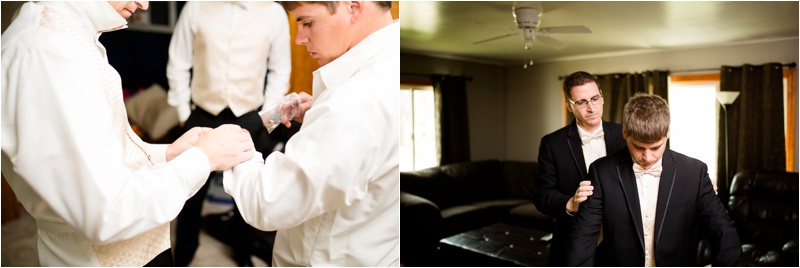 Groom in white button up shirt gets help putting on cuff links