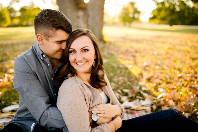 fall engagement photo with leaves