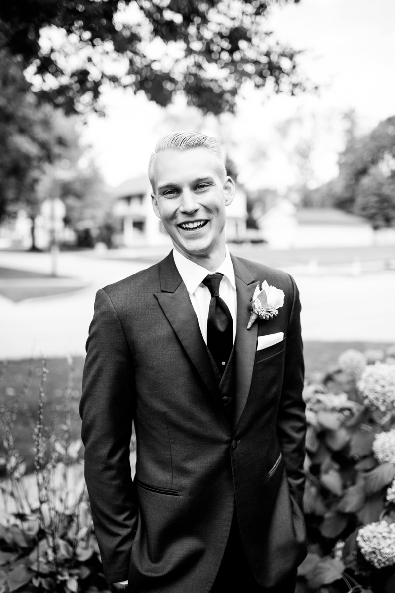 black and white picture of groom in naperville il