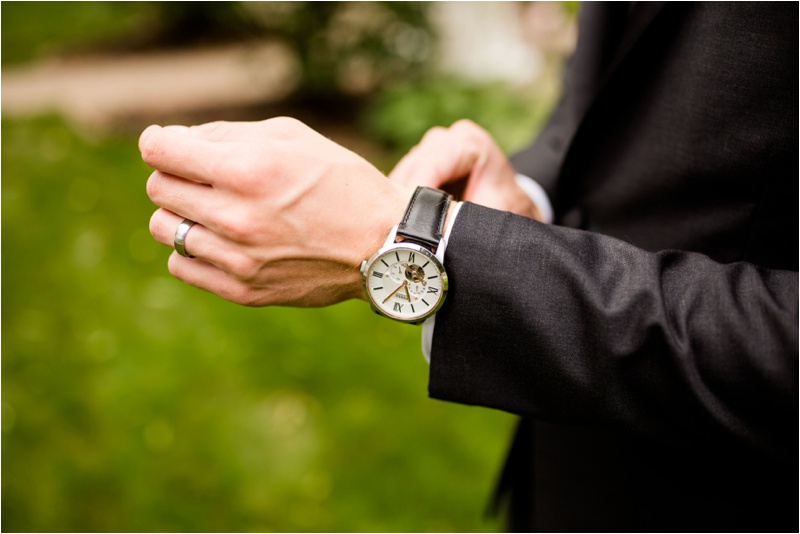 Groom with his new watch given to him by his bride