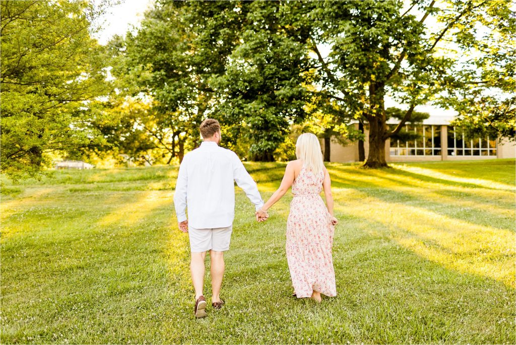 Caitlin and Luke Photography, Washington Park Botanical Gardens engagement photos, Springfield IL engagement session, summer Washington Park Botanical Gardens engagement portraits with bride in floral gown and groom in white shirt