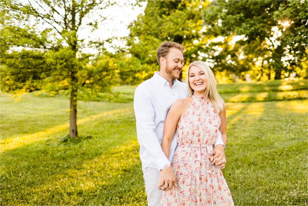 Caitlin and Luke Photography, Washington Park Botanical Gardens engagement photos, Springfield IL engagement session, summer Washington Park Botanical Gardens engagement portraits with bride in floral gown and groom in white shirt