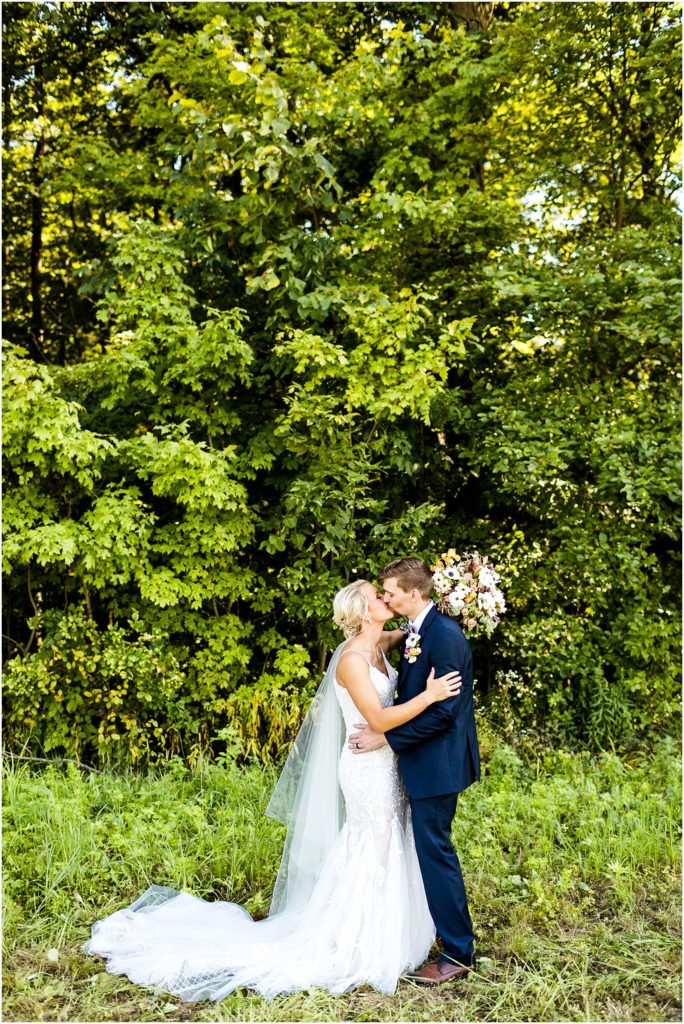 portraits of bride and groom by Caitlin and Luke Photography, St. Michael's Church wedding, Fort Loramie OH wedding photographers, church wedding, Ohio wedding photographers