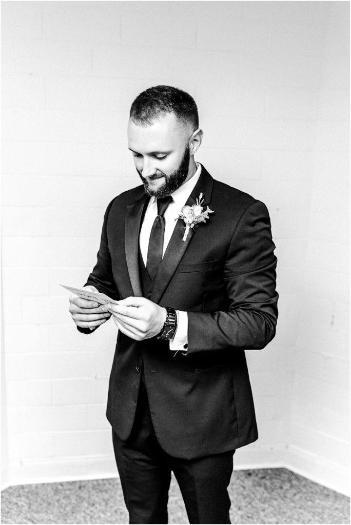 groom prepares for wedding day with Caitlin and Luke Photography | The Warehouse on State wedding, Peoria IL wedding photographers, Illinois wedding photographers, IL wedding day
