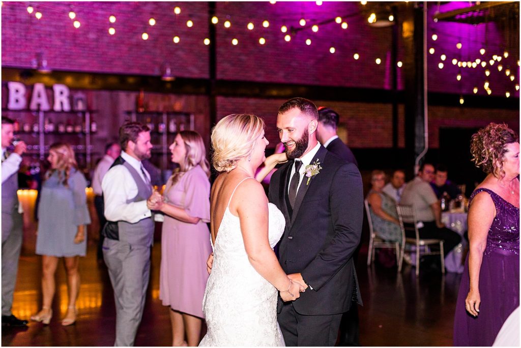 reception in Illinois photographed by Caitlin and Luke Photography | The Warehouse on State wedding, Peoria IL wedding photographers, Illinois wedding photographers, IL wedding day
