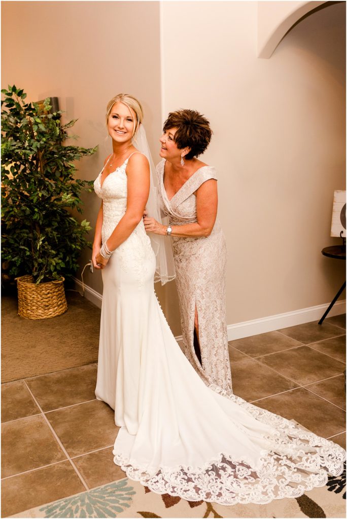 bride and mom prepare for IL wedding with Caitlin and Luke Photography, Bloomington Wedding Photographers, Illinois Wedding Photographer, Holiday Inn & Suites Bloomington Wedding Photos