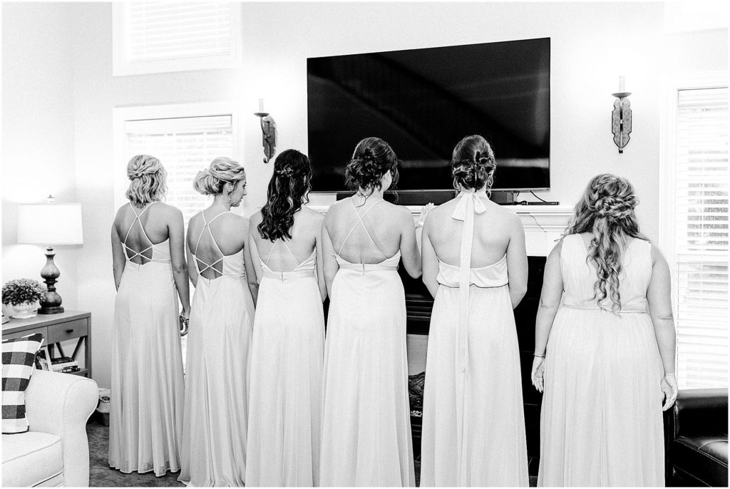 bridesmaid first look photographed by Caitlin and Luke Photography, Bloomington Wedding Photographers, Illinois Wedding Photographer, Holiday Inn & Suites Bloomington Wedding Photos