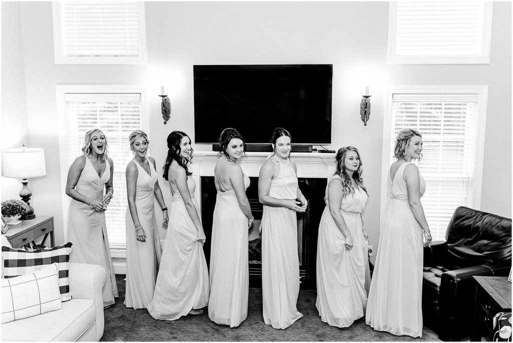 bridesmaid first look photographed by Caitlin and Luke Photography, Bloomington Wedding Photographers, Illinois Wedding Photographer, Holiday Inn & Suites Bloomington Wedding Photos