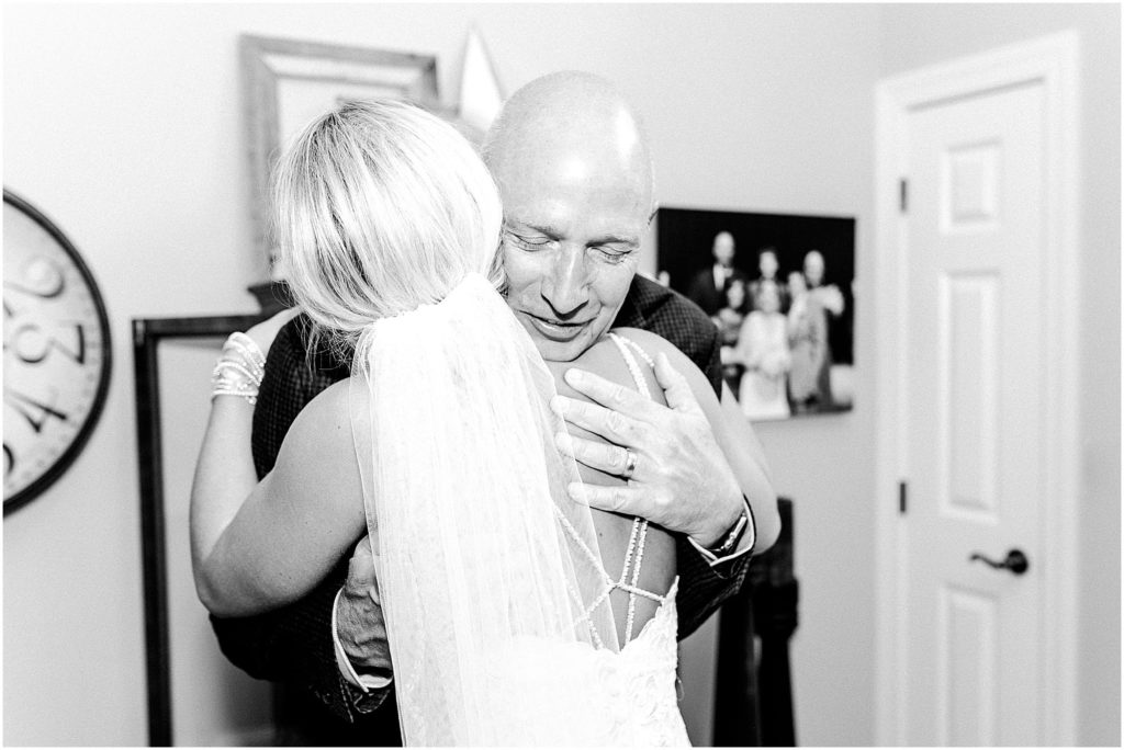bride and dad first look photographed by Caitlin and Luke Photography, Bloomington Wedding Photographers, Illinois Wedding Photographer, Holiday Inn & Suites Bloomington Wedding Photos