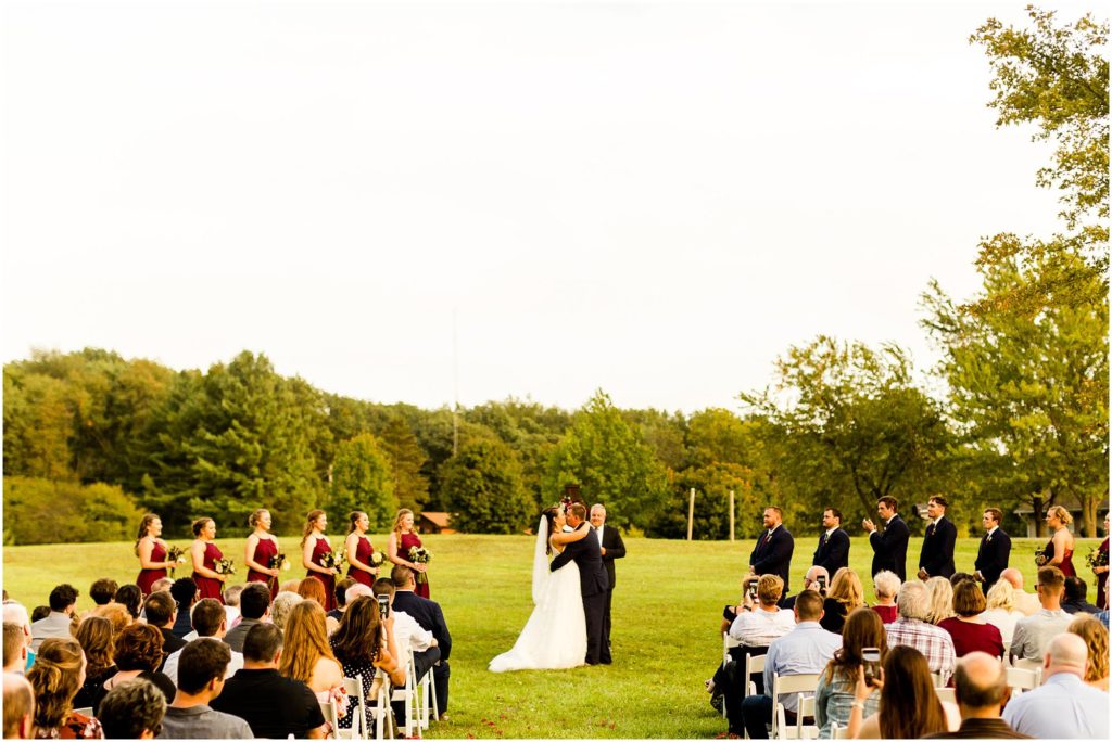 farm ceremony for fall wedding at Lake of the Woods Forest Preserve photographed by Caitlin and Luke Photography, Illinois wedding photographers, Urbana IL wedding photographers, Mahomet IL wedding photographers