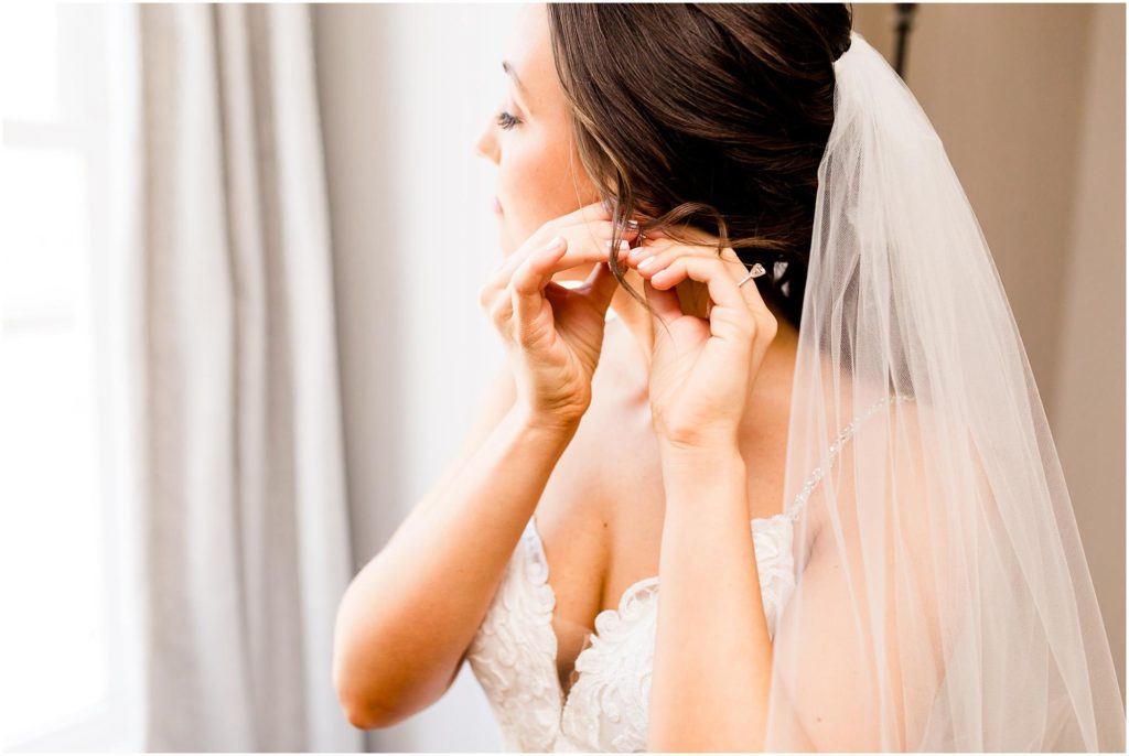 bride prepares for Pritzlaff Events wedding in Milwaukee WI photographed by Wisconsin wedding photographers Caitlin and Luke Photography