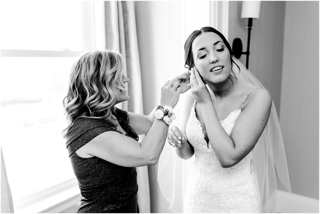 bride prepares for Pritzlaff Events wedding in Milwaukee WI photographed by Wisconsin wedding photographers Caitlin and Luke Photography