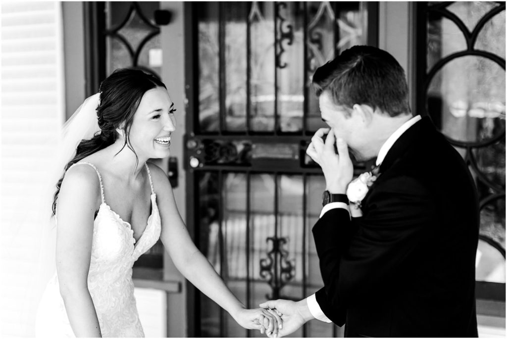 bride and groom have first look in Milwaukee WI photographed by Milwaukee WI wedding photographer Caitlin and Luke Photography