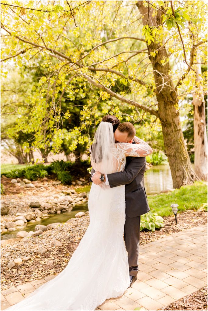 first look before Pear Tree Estate wedding photographed by Champaign Illinois wedding photographers Caitlin and Luke Photography
