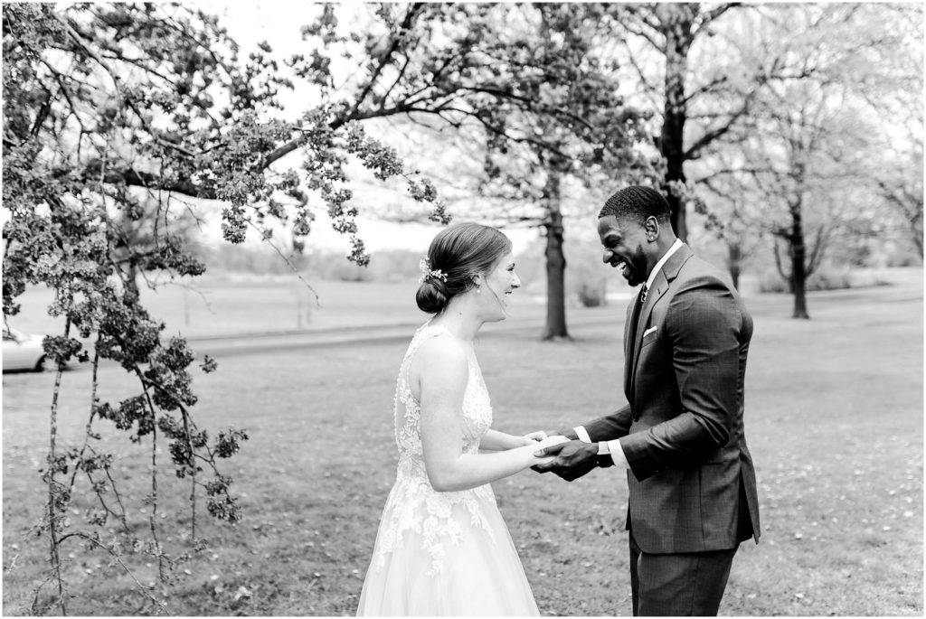 first look before Countryside Banquet Facility wedding photographed by Bloomington Illinois wedding photographer Caitlin and Luke Photography, IL wedding day in the spring