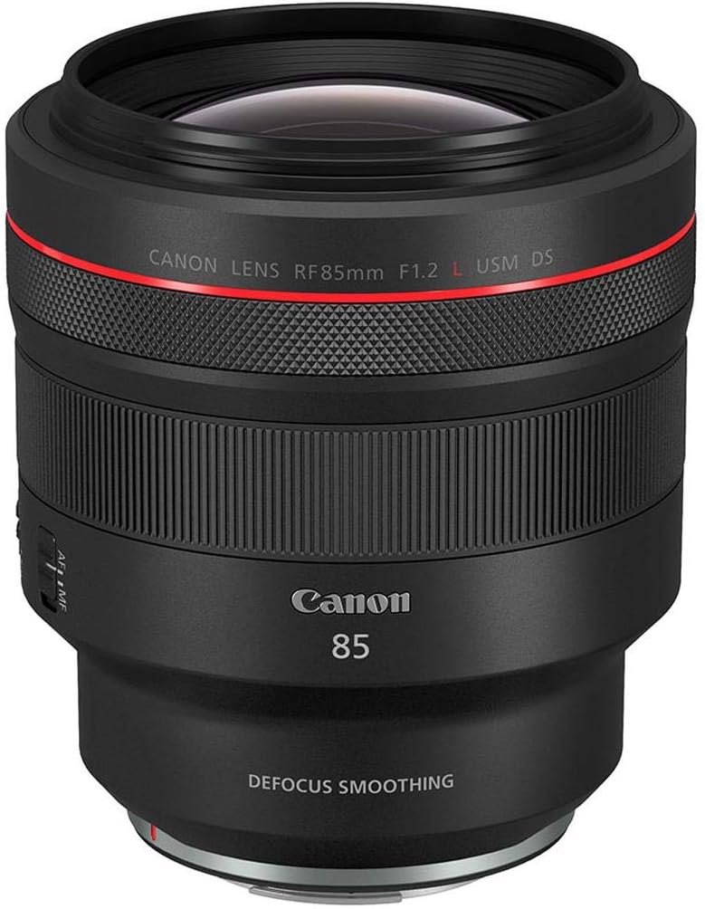 Product photo of the Canon RF 85mm f/1.2L lens, displaying a black professional lens with Canon branding and a distinctive red ring.