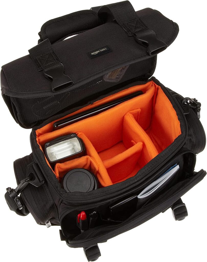 Amazon Basics DSLR camera bag interior showing orange organization system - affordable camera bag for photographers